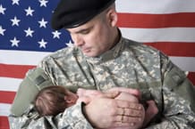 Soldier Holding Baby